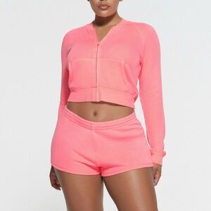 SKIMS Bright Pink Hoodie and Shorts Set